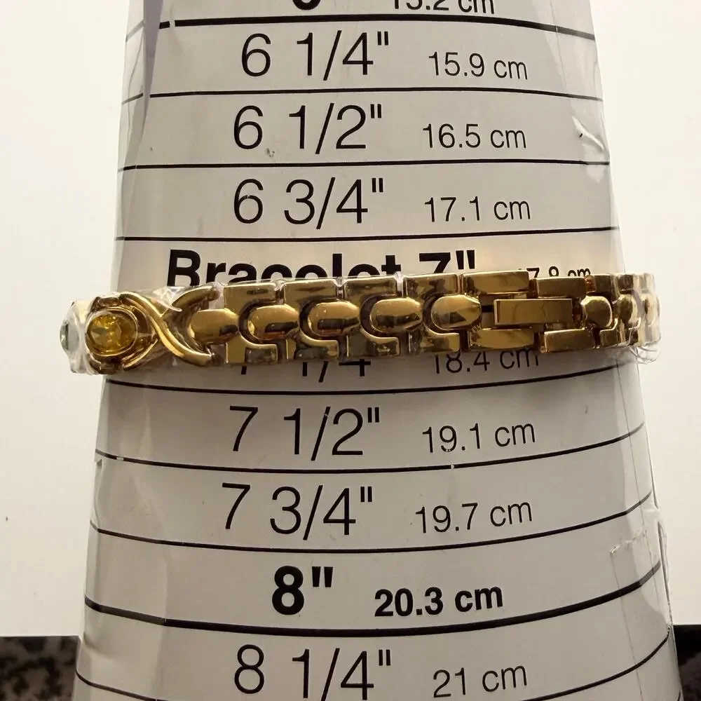 Elegant Gold-Tone Women's Bracelet Watch - Oval Dial & Gemstones New Battery